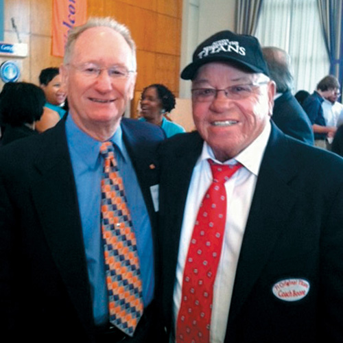 Gareth V. &ldquo;Lefty&rdquo; Biser &rsquo;57 with T.C. Williams coach Herman Boone