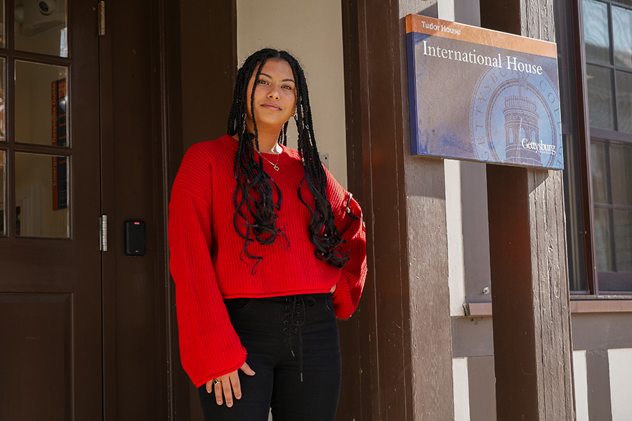 Meriem stands in front of International House