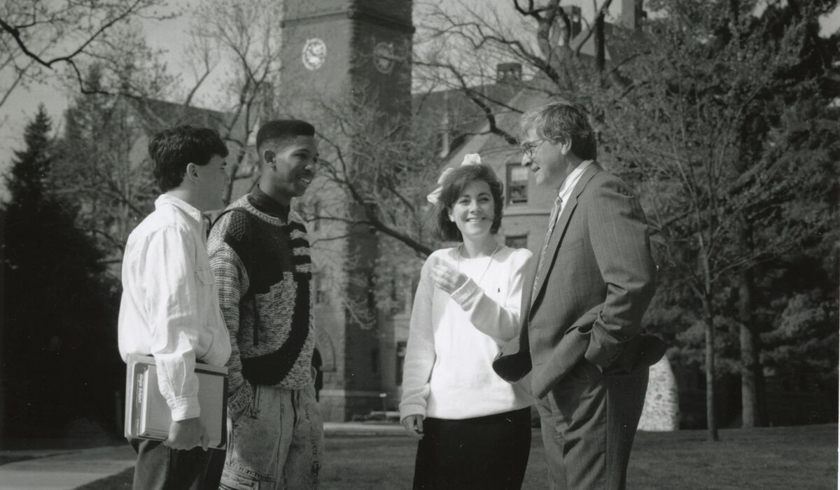 President Gordon Haaland talking with students