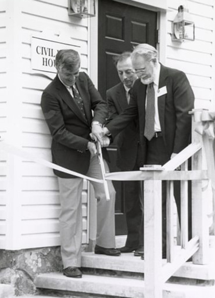 President Gordon Haaland cutting the ceremonial opening ribbon.