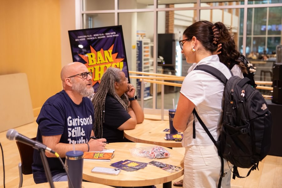 Jackson and Hodge signed copies of their new book &ldquo;Ban This!&rdquo; for students at the book launch event in The Junction.