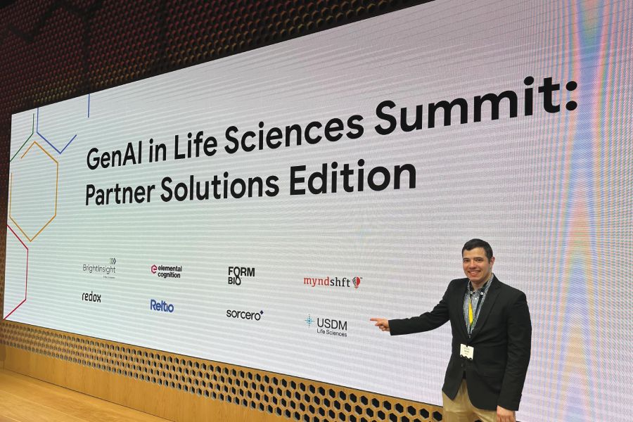 Garrett Goodwin &rsquo;21 presents at an AI conference.