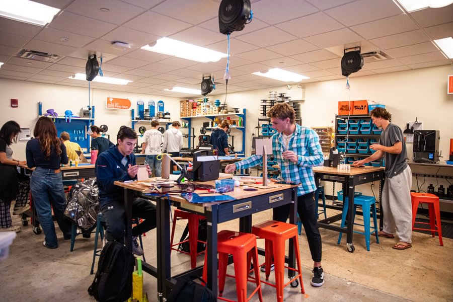 Students working on class projects inside the innovation center..