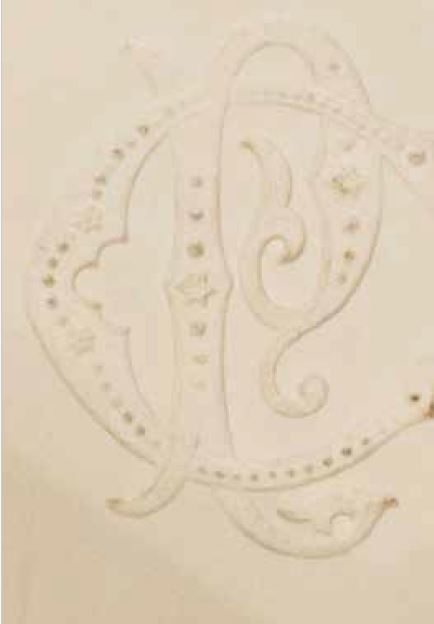 PC monogram in orange and blue