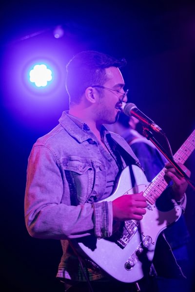  Pradhan performs on stage during a Listeners & Performer&rsquo;s event.