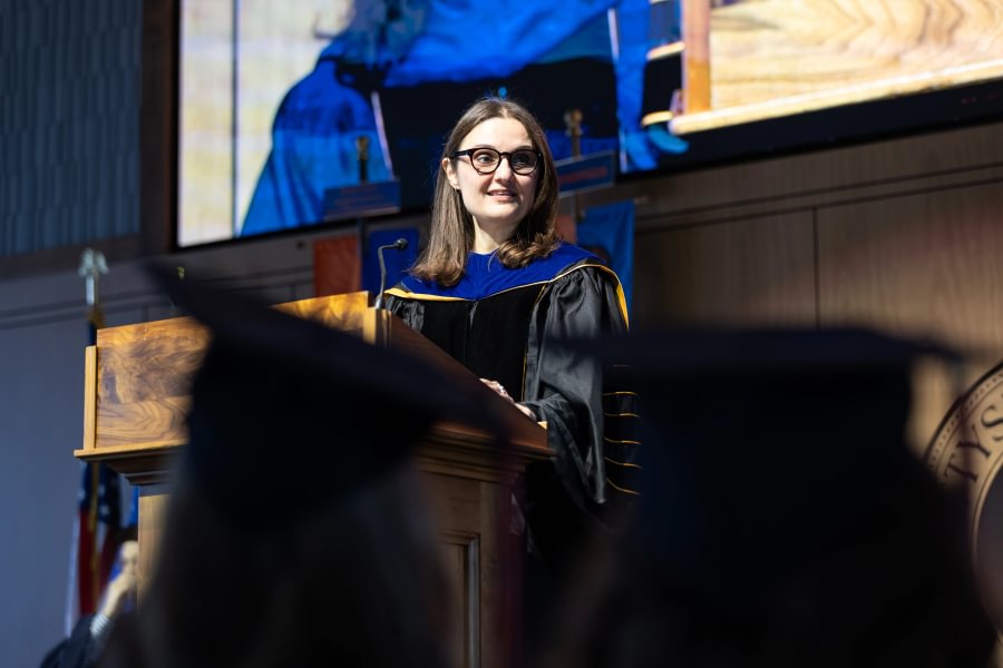 Spanish Prof. Radost Rangelova addresses the women&rsquo;s lacrosse seniors during Special Commencement.